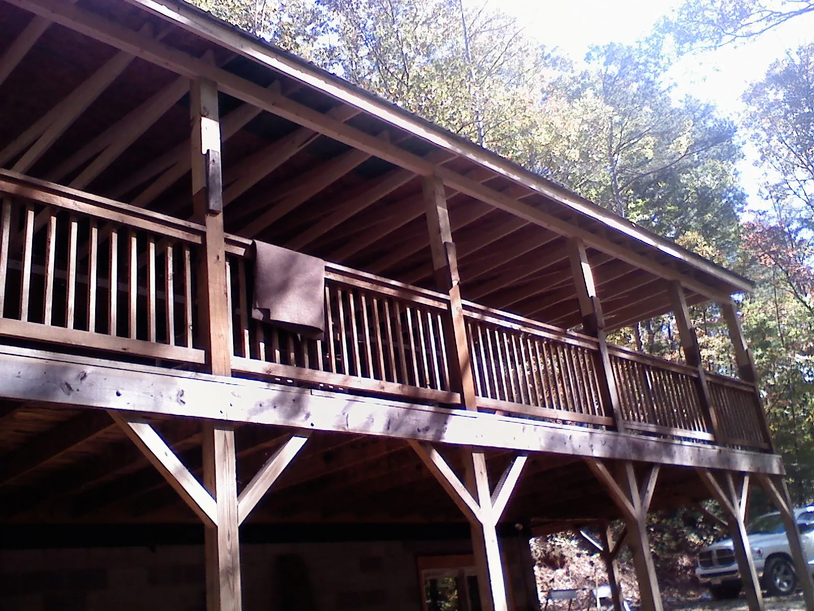 Timber framing under a new elevated porch and deck — Roof Leak Repair in Dunkirk by Roofing Brothers